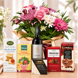 Flower and goodies, gourmet treats and red local wine