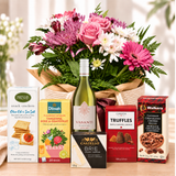 Flower and goodies, gourmet treats and white local wine