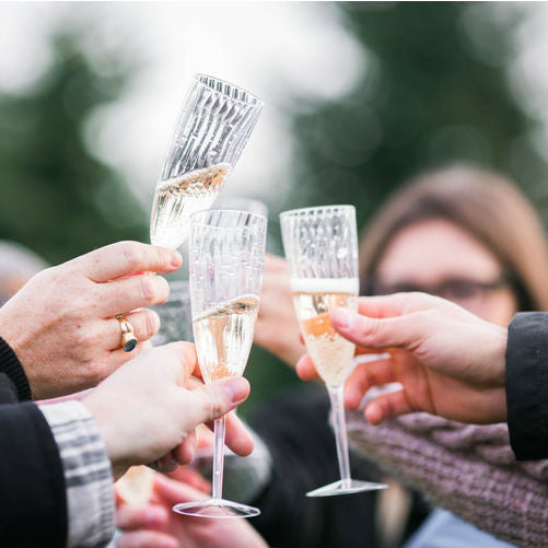 A bottle of French Champagne packaged with a gourmet gift basket for delivery in Vancouver